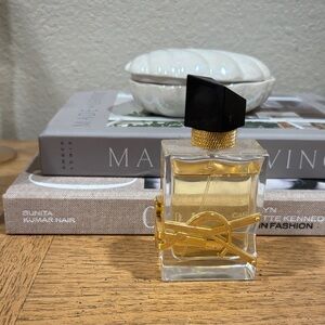 Yves Saint Laurent Gold and Black Perfume Bottle